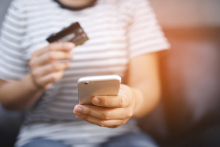 concept man to shopping Convenient instant. Customers can use the phone to shopping online Order purchase Sell and Payment with Credit Cards Do not have to travel having to shop store.の写真素材