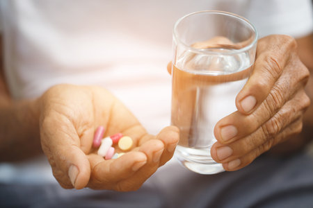 Elderly people taking medication for depressionの写真素材
