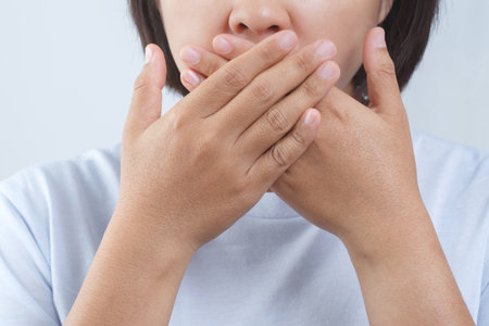 Women have bad breath caused by swollen gums.の写真素材