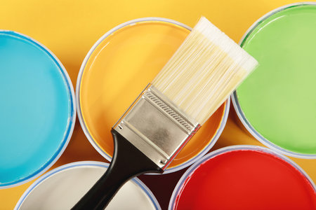 Texture paint cans and paint brushes and how to choose the perfect interior paint color and good for healthの写真素材