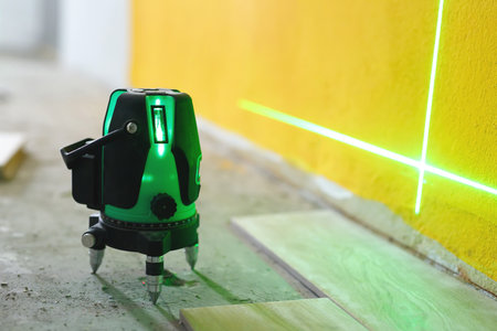 laser tile leveler for floor tiling installation in a roomの写真素材