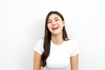 Model asian woman is emotional happy and excited to receive the prizeの写真素材