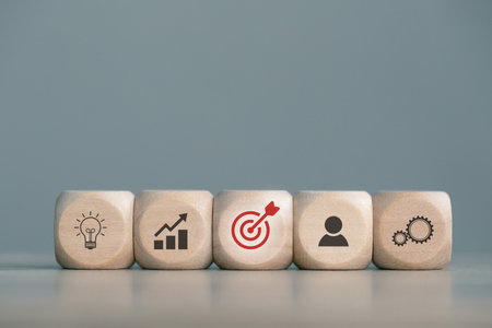 wood cube block with organizational growth and sales according to business goalsの写真素材
