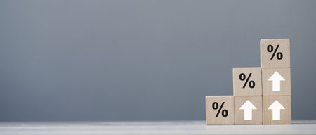 wood cube block with growth according to business goalsの写真素材