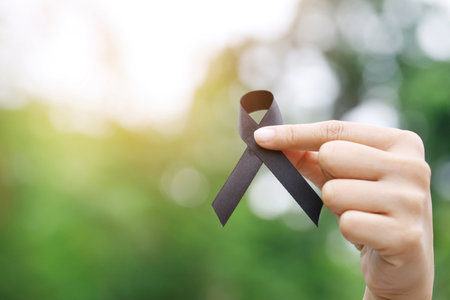 woman with black ribbon For patients with breast and cervical cancerの写真素材