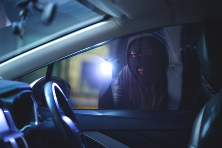 Car thief fleeing from policeの写真素材