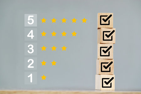 wood cube block with customer satisfaction rating to measure product evaluationの写真素材