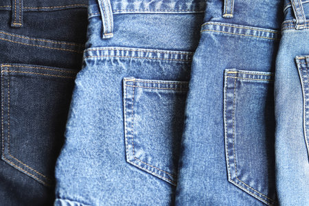 beautiful fashion jeans Stacked in layers at the jeans storeの写真素材