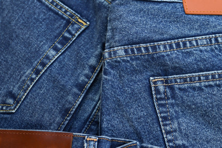 beautiful fashion jeans Stacked in layers at the jeans store
