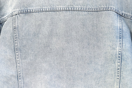 Fashionable denim jeans for teenagers texture backgroundの写真素材