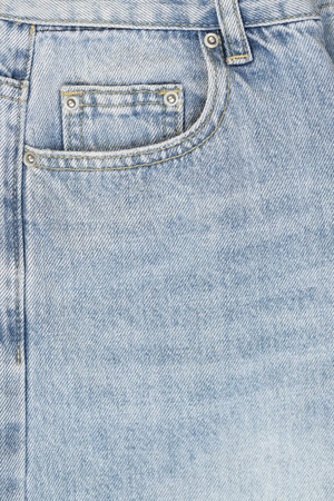 Fashionable denim jeans for teenagers texture backgroundの写真素材