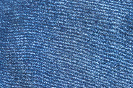 Fashionable denim jeans for teenagers texture backgroundの写真素材