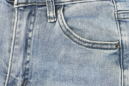 Fashionable denim jeans for teenagers texture backgroundの写真素材