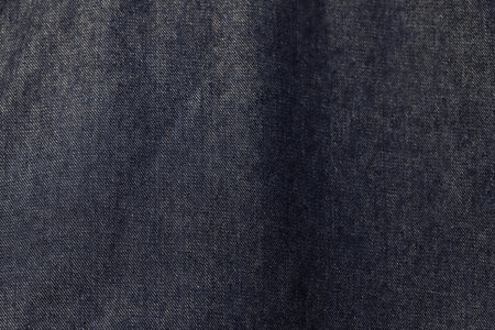 Fashionable denim jeans for teenagers texture backgroundの写真素材