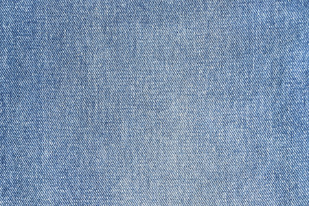 Fashionable denim jeans for teenagers texture backgroundの写真素材