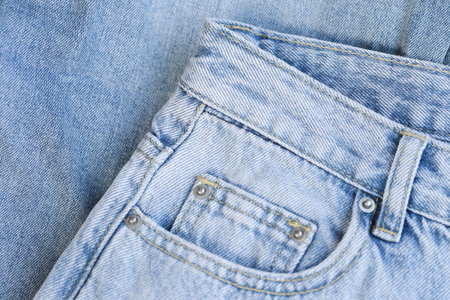 Fashionable denim jeans for teenagers, texture 
backgroundの写真素材