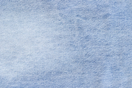 Fashionable denim jeans for teenagers texture backgroundの写真素材