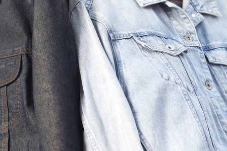 Fashionable denim jeans jacket for teenagers texture backgroundの写真素材