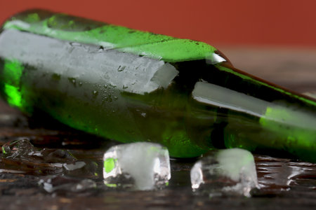 cold green beer bottle comes with a refreshing touch.の写真素材