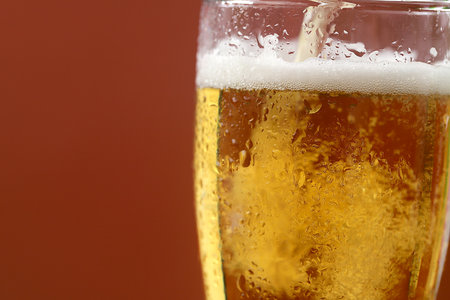 Drinking beer in moderation can help you feel relaxed after a hard day.の写真素材