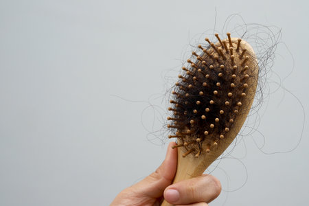 Woman with hair loss dryness and frizziness