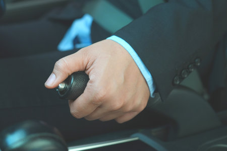 handbrake helps your car to stop while parked without having to keep your foot on the brake pedal.の写真素材