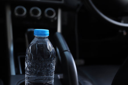 The water bottle in the car