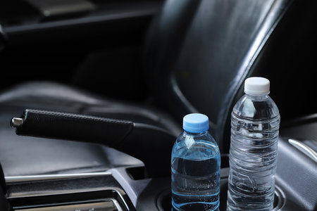 bottle of water in the carの写真素材
