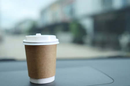 Cups of fresh coffee in the car with the journeyの写真素材