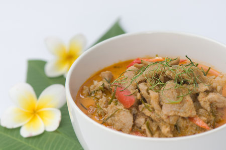spicy pork curry in white bowlの写真素材