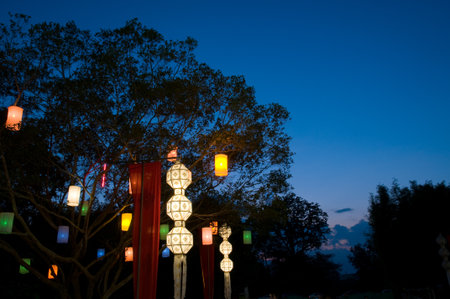 colorful lantern on the tree in evening at Yee Peng festival  Chaing Mai province Thailandのeditorial素材