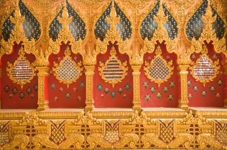Thai art stucco on the wall at Wat Phramahajedi Chaiyamongkol Roi Et province Thailandのeditorial素材