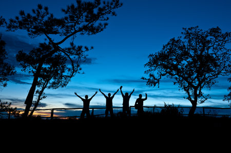 silhouette landscape and photographer at Phu Soi Dao national park Thailandの写真素材