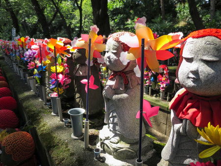 Stone statues of Jizo at the cemetery of Zojo-ji temple, Japanのeditorial素材