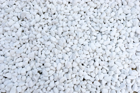 Small smooth white pebbles textureの写真素材