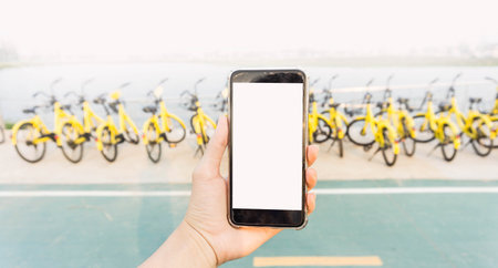 Smartphone used to unlock the bike.の写真素材