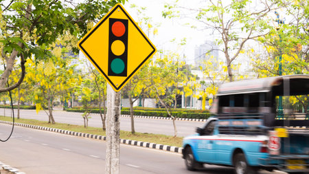 Traffic light sign,bus,Gloden shower tree.