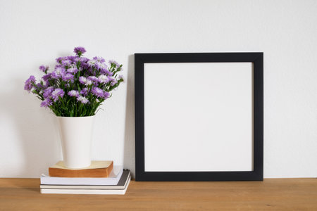 mock up square frame posterの写真素材