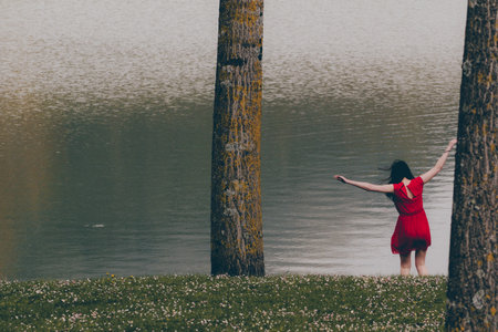 The girl in red IIIの写真素材