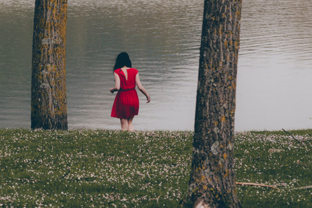 The girl in red IIの写真素材