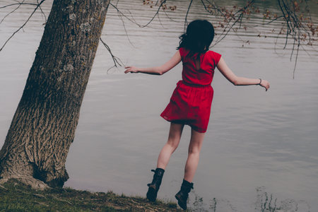 The girl in the redの写真素材