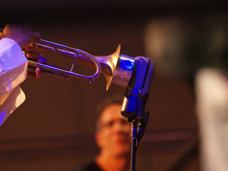 Trumpet close to the microphone at the music concertの写真素材