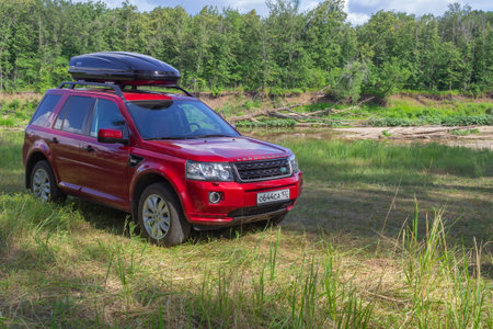 RUSSIA, Rep. BASHKORTOSTAN, Kugarchinsky District, AIGAI-MURSALAY village - JULY 14, 2018. SUV LAND...