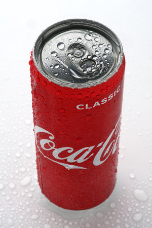 Russia, Republic of Bashkortostan, Mrakovo, - May 07, 2020: Coca-Cola aluminum can. White background. Water drops. Partly blurred. Close-up.のeditorial素材
