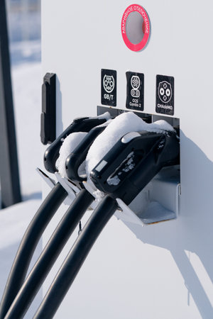 Mrakovo, RUSSIA - MARCH 9, 2026: A detailed shot of GB/T, CCS Combo 2, and CHAdeMO charging...