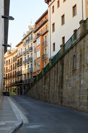 A picturesque street adorned with colorful facades and a captivating medieval-styleの写真素材
