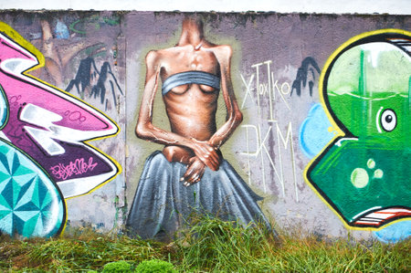 10-20-2012 Guernica, Spain - A dazzling graffiti masterpiece, bursting with colors and imagination, transforms the urban landscapeのeditorial素材