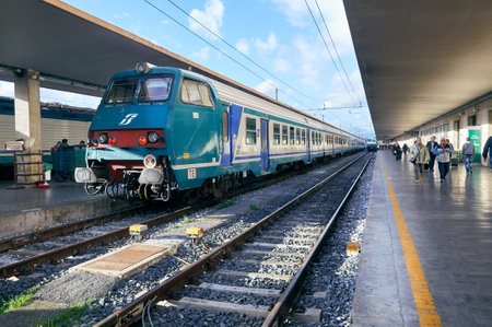 06-11-2013 Florence, Italy - A train waits on the platform at Florence station, ready for departureのeditorial素材