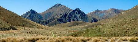 Panoramic mountain view in south island new zealand. Photo taking while driving through south island.の写真素材