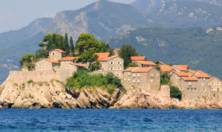 Sveti Stefan island detail of buildings over the sea. Saint Stephen island is a small islet in Mediterranean Sea, Montenegroのeditorial素材